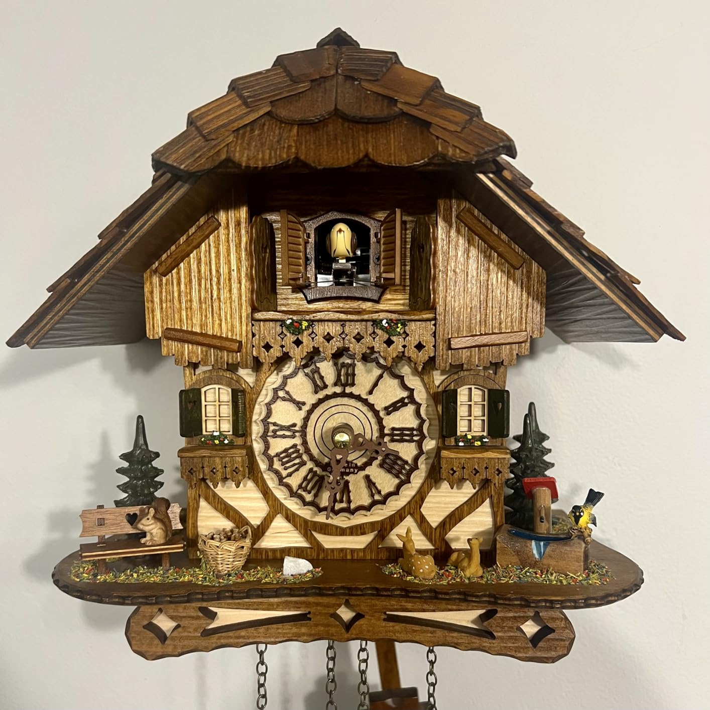 German Cuckoo Clock - Black Forest Hillside Chalet with Animal Figures - Quartz Movement with Music - Night Silence Sensor - 10.6 Inch Wall Clock customer photo 1