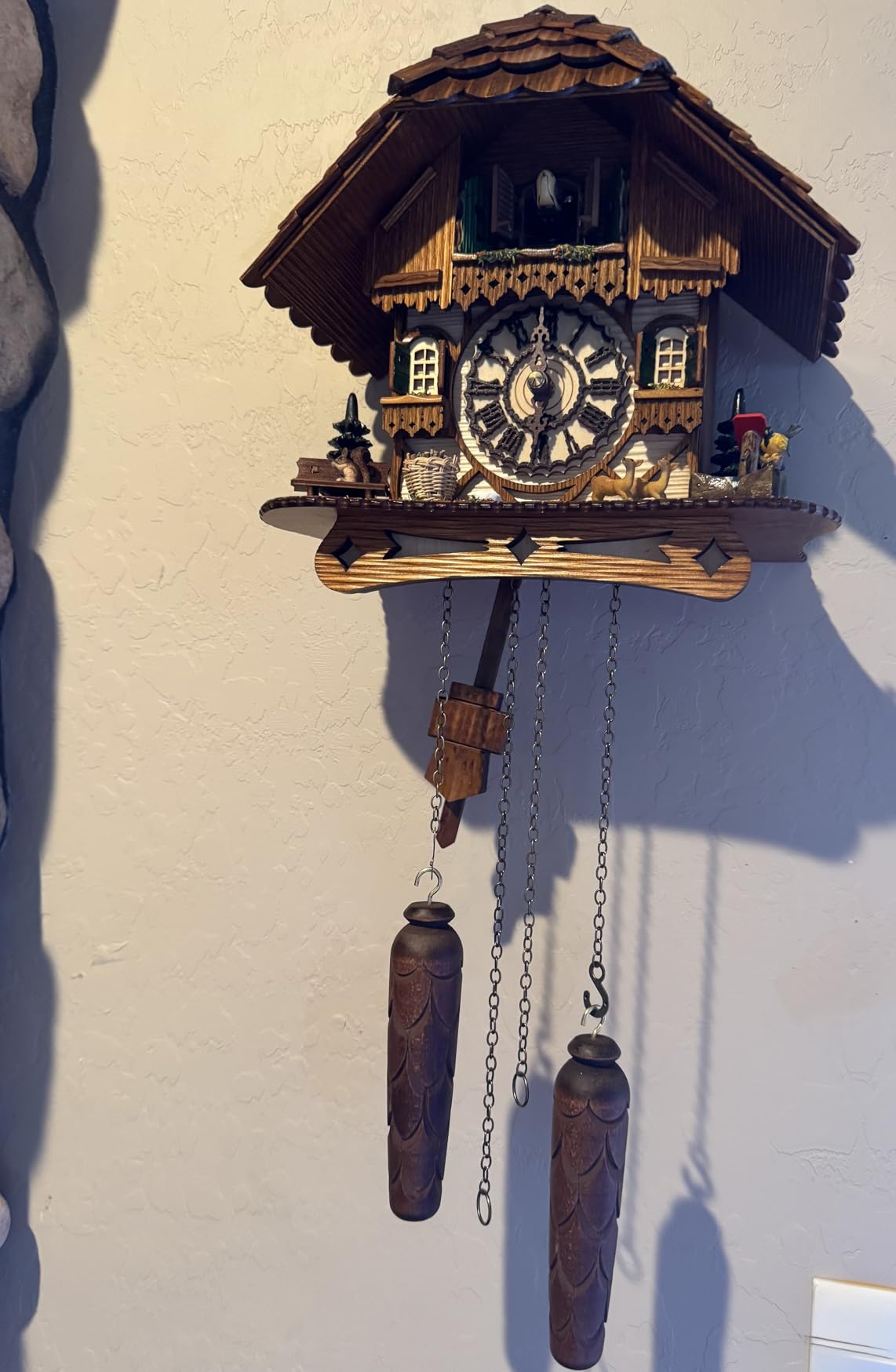 German Cuckoo Clock - Black Forest Hillside Chalet with Animal Figures - Quartz Movement with Music - Night Silence Sensor - 10.6 Inch Wall Clock customer photo 2