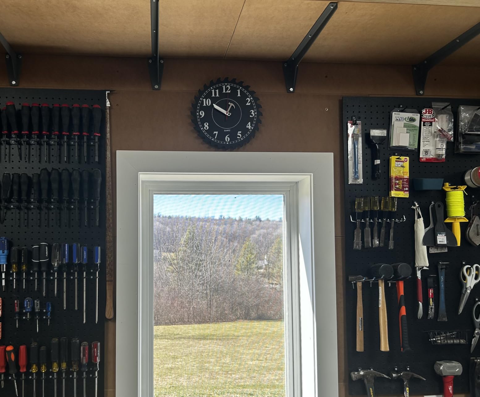12 Inch Metal Wall Clock with Circular Saw Blade Dial, Handsaw and Hammer Pointer, Great Decor for Garage, Workshop and Man Cave customer photo 2