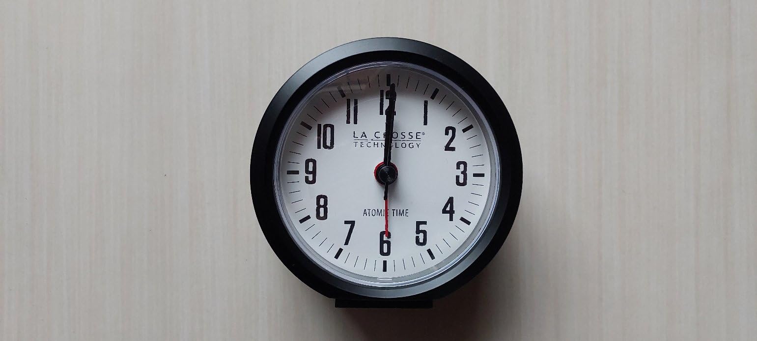 La Crosse Technology 617-710B-INT 4-Inch Round Black Atomic Analog Alarm Clock customer photo 2