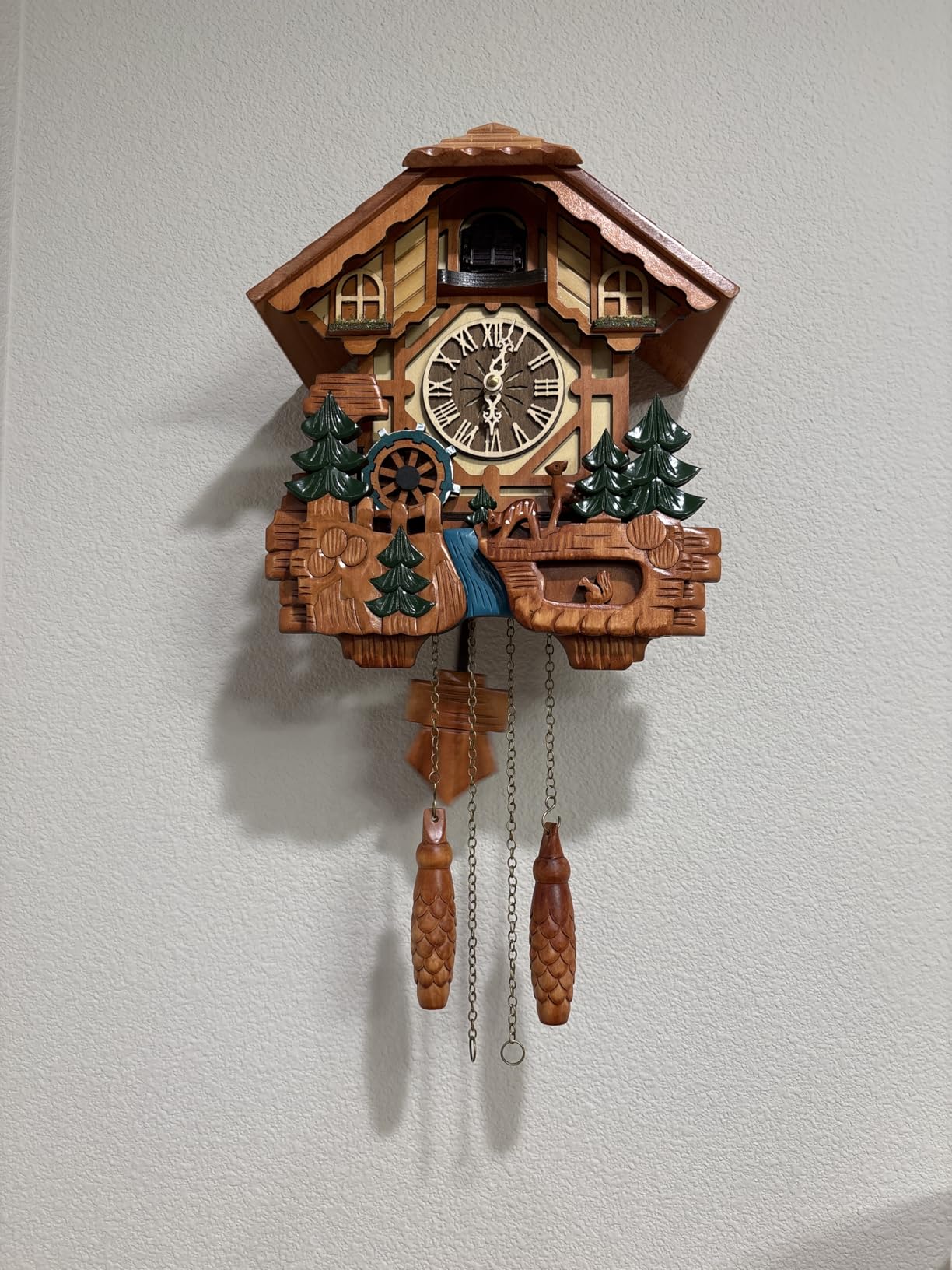 Cuckoo Clock Traditional Black Forest Chalet Style 11x22.5 Inches | Handcrafted Wooden Wall Clock with Singing Bird, Spinning Waterwheel, Night Mode and 12 Melodies customer photo 1