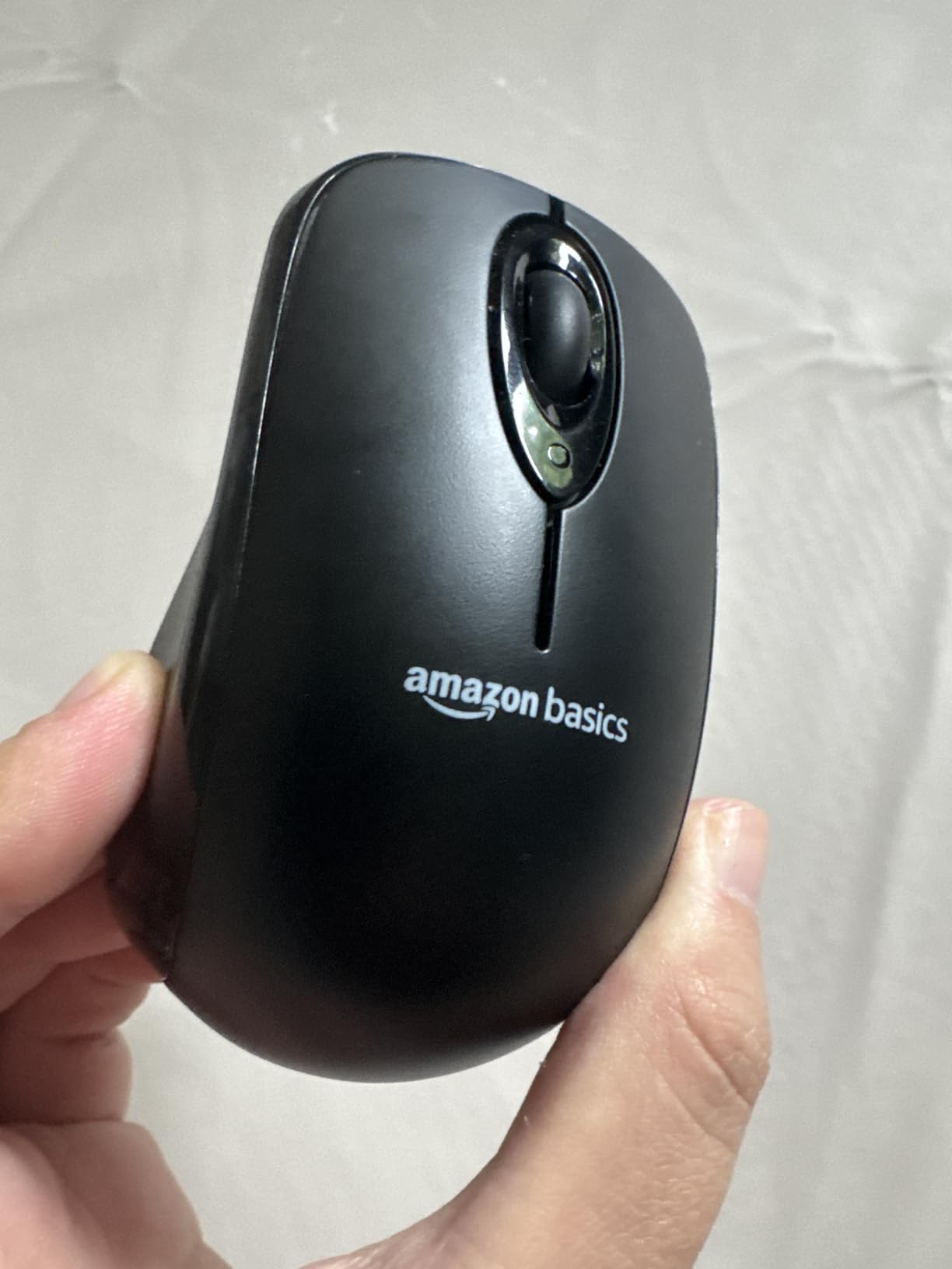 Amazon Basics 2.4 GHz Wireless Optical Computer Mouse with USB Nano Receiver, Portable, No Wires, Smooth Tracking, Multi-Device Compatibility, Black customer photo 1