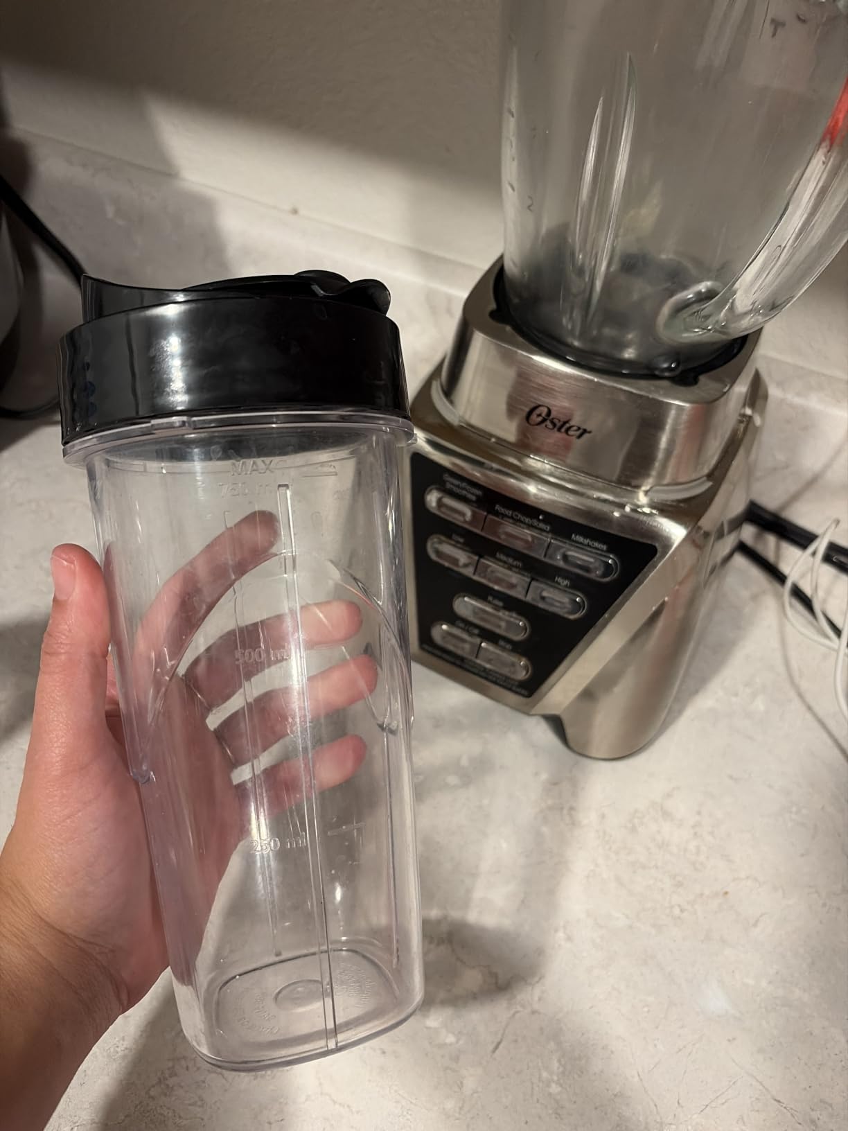 Oster Pro 1200 Smoothie Blender with Glass Jar & 24oz To-Go Cup, Countertop Kitchen Blender with 7 Speeds, 1200W Power, Brushed Nickel customer photo 2