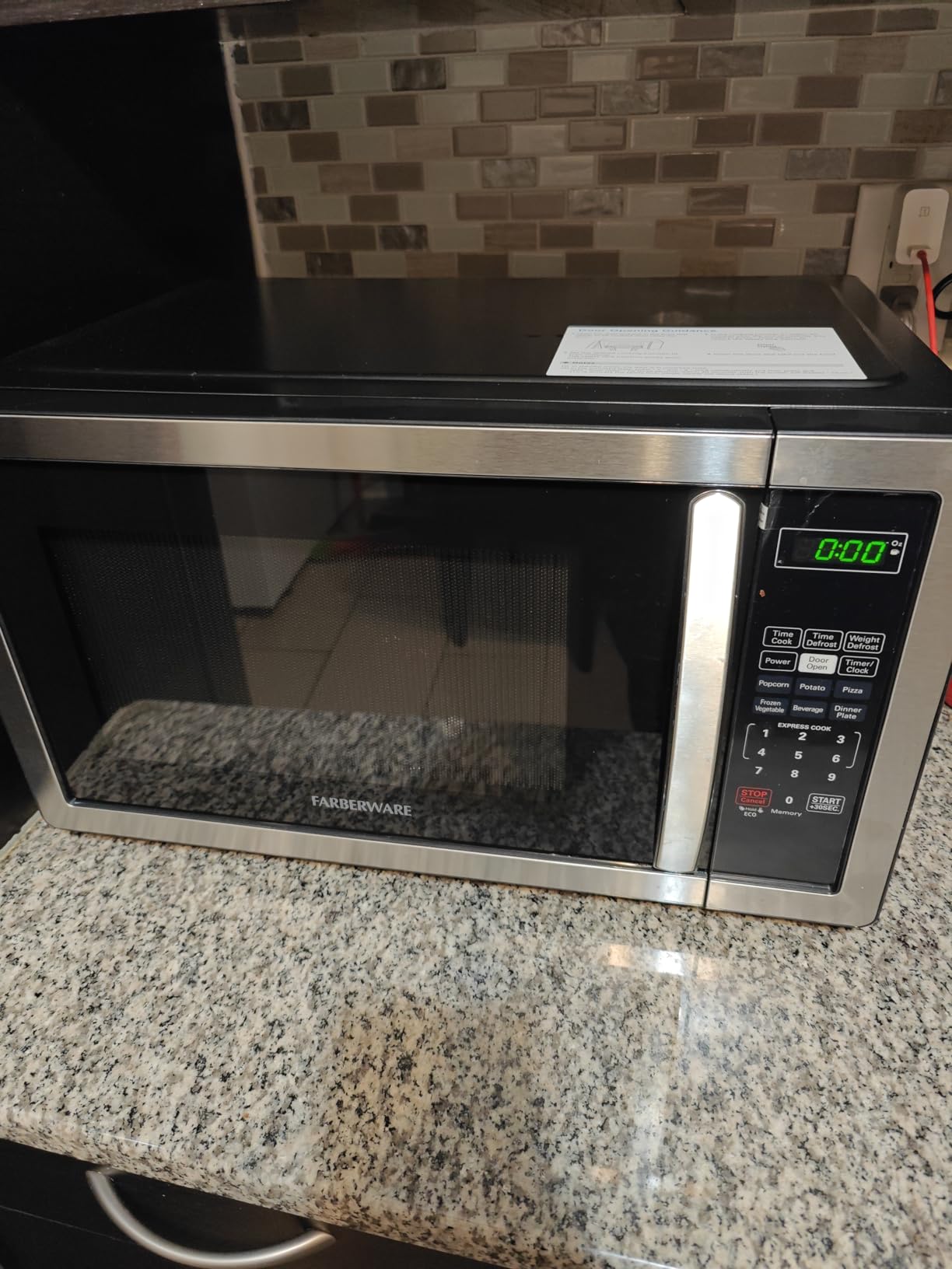 Farberware 1.1 Cu. Ft. Countertop Microwave Oven – 1000 Watts Power, Auto Cook Settings, Defrost, Easy Clean and Child Safety Lock - Stainless customer photo 1