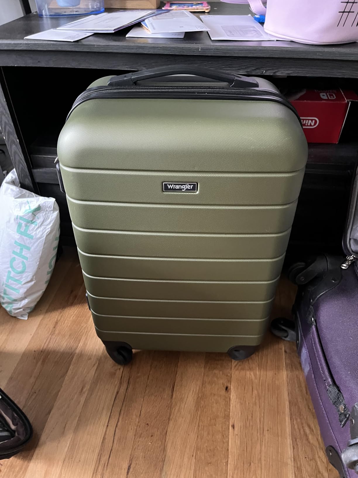 Wrangler Smart Spinner Hardside Luggage, 22-Inch Carry-On, Black customer photo 1