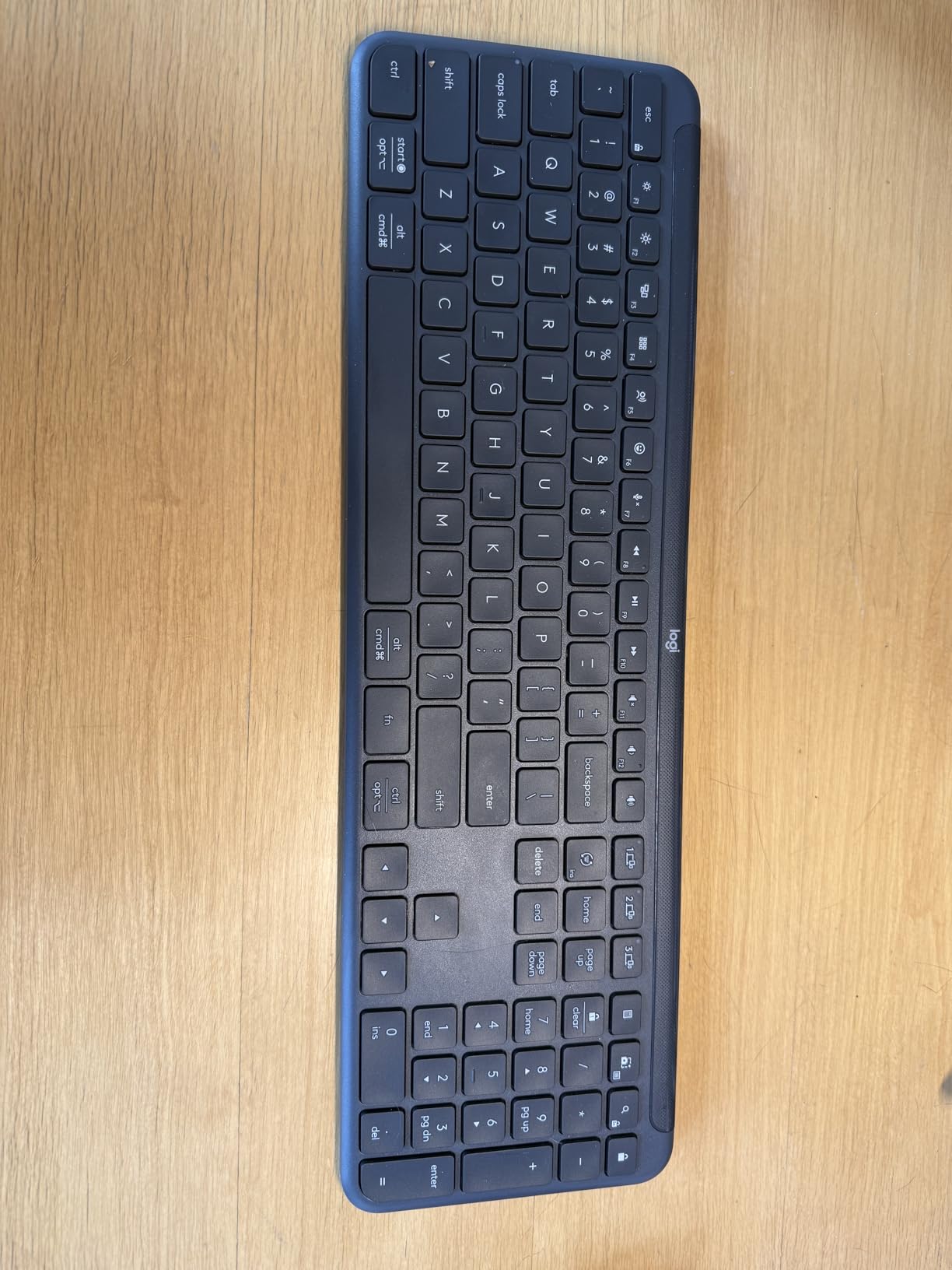 Logitech Signature Slim K950 Wireless Keyboard with Quiet Typing - Graphite | Full size, sleek design with number pad, laptop-style typing, pair up to 3 multi-OS devices, Multi-OS, Windows, Mac, Chrome customer photo 1