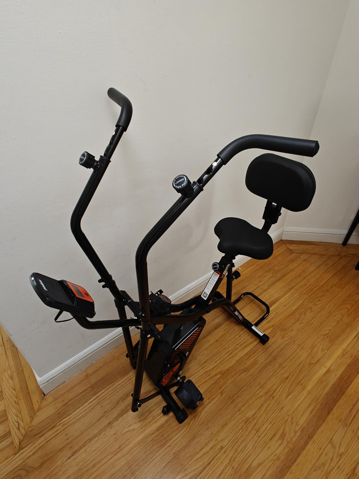 pooboo Folding Magnetic X‑Bike, Upright Exercise Bike for Home Gym | Foldable Indoor Stationary Cycling Bike, 8‑Level Resistance, 6.6 LBS Flywheel, 300 LB Capacity, Back Support Cushion customer photo 2